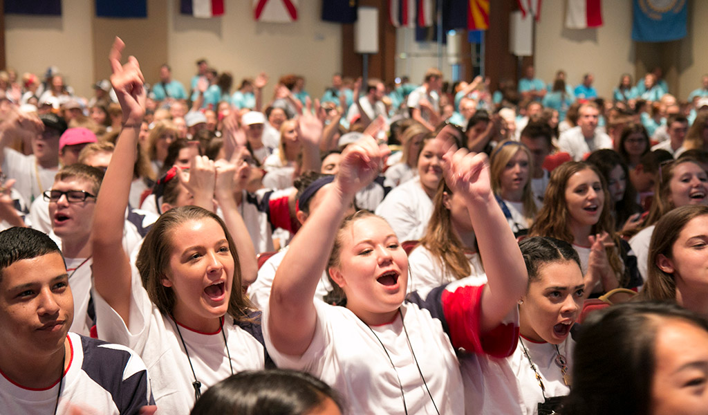 Youth Tour participants cheer at an event