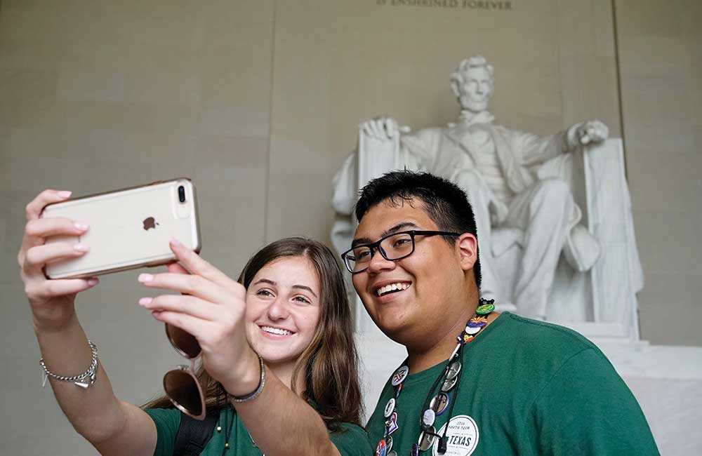 Youth Tour participants take a selfie at the Lincoln Memorial